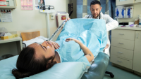 Transgender man getting medical exam.